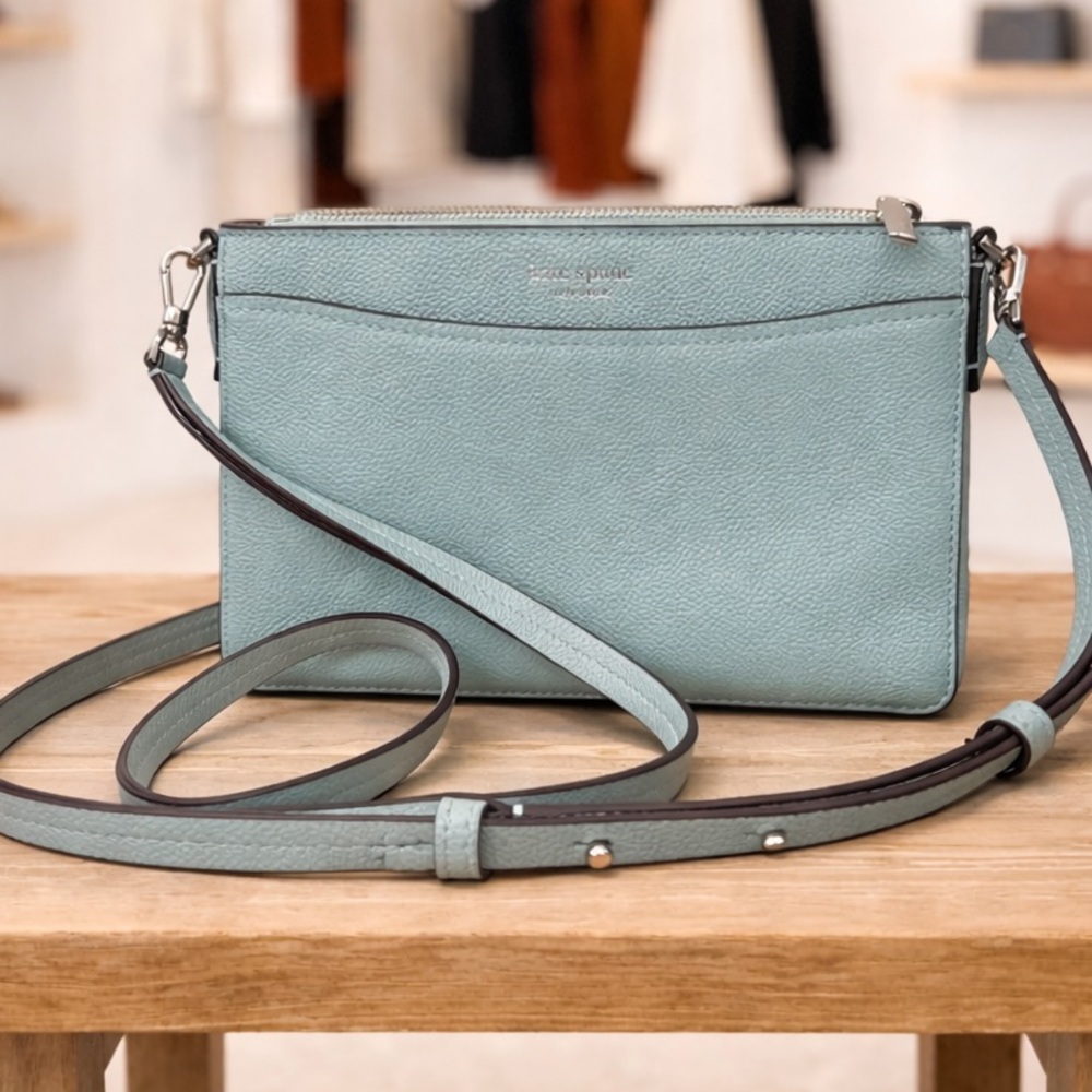 Kate Spade ice blue pebbled leather crossbody bag.